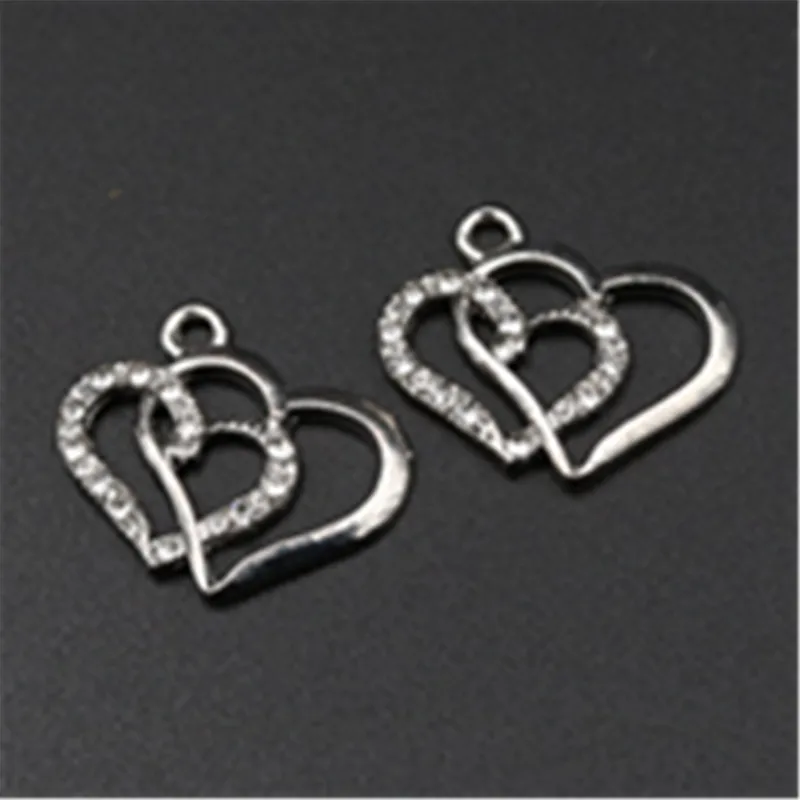 

10pcs new Antique silver Hand drill Double hearts charm alloy pendants for DIY jewelry charm findings A569