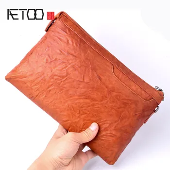 

AETOO New cowhide men's large-capacity retro clutch multi-function Messenger bag leather handbag