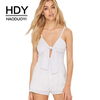 

HDY Haoduoyi Brand 2020 Women White Sexy Playsuits Deep V-Neck Sleeveless Cold Shoulder Hollow Out Slim Lace Up Playsuits Lady