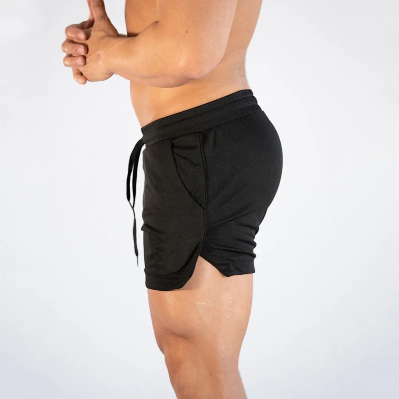 Мужские спортивные шорты Muscleguys для фитнеса, сетчатые быстросохнущие дышащие спортивные шорты, мужские шорты для фитнеса, шорты для бега, пляжные спортивные шорты - Цвет: Черный