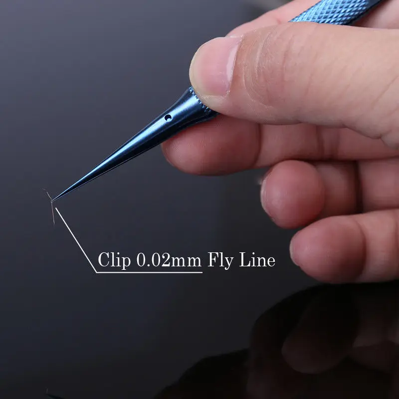 Linha da mosca do microscópio da liga