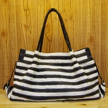 La Manera del envío libre bolsa de viaje en blanco y negro bolso de las mujeres de cuero real primera capa de piel de vaca grandes bolsas de tamaño 50*31*15 cm