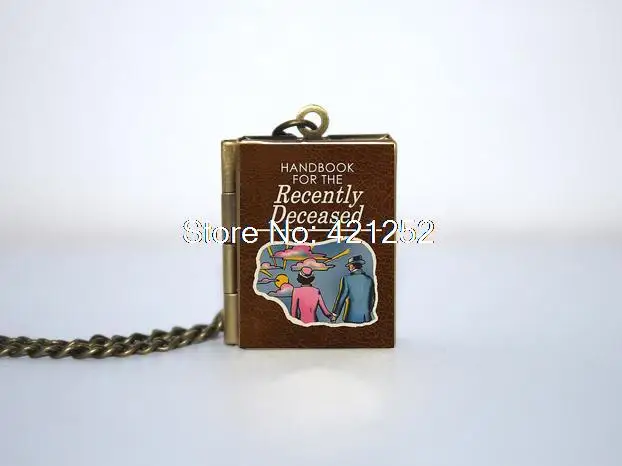 

Handbook for the Recently Deceased Book Locket Necklace Keyring silver Bronze tone