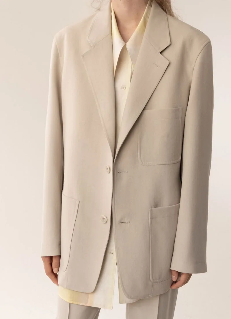 

Wool blazer Single Breasted Big Patch pockets Lapel Collar Long Sleeves Fashion long blazer suit One chest pocket