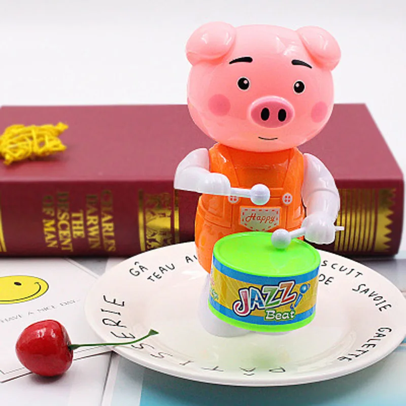 

Winding Clockwork Toy Drum Pig Children's educational Toys Winding Drum Auspicious Pig Cartoon Holiday Gift