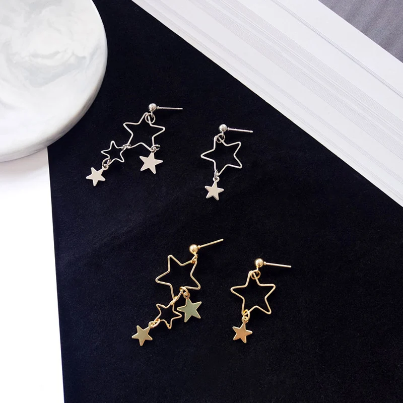 

2019 New Fashion Korean Fresh and Simple Temperament Hollow Star Asymmetric Alloy Earrings Ladies Jewelry Gift Wholesale