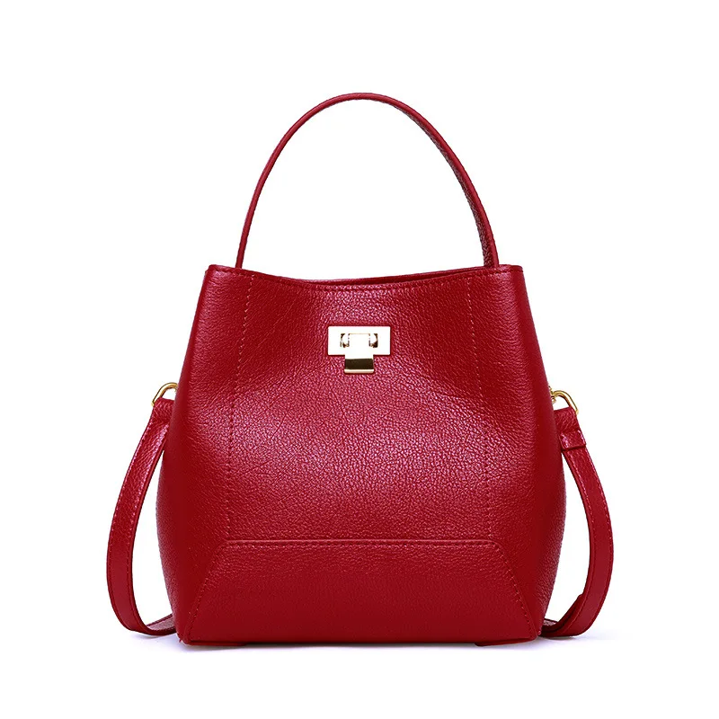 Elegant and refined solid color lychee leather female bucket bag large capacity lock and open the door of women leather handbags