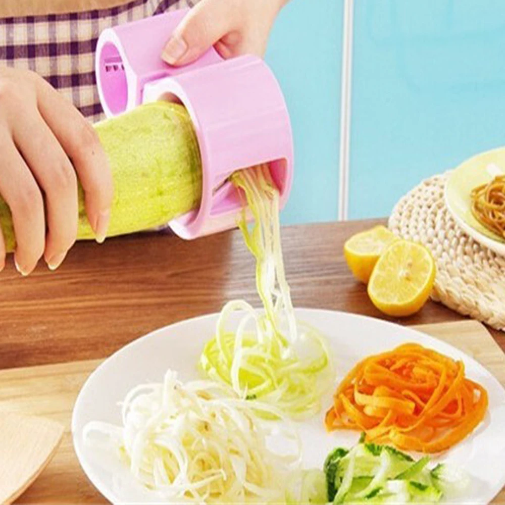 https://ae01.alicdn.com/kf/HTB13Im7QFXXXXbdXVXXq6xXFXXXI/Walfos-1-Pc-2-in-1-Vegetable-Grater-With-Knife-Sharpener-Spiral-Carrot-Slicer-Stainless-Steel.jpg