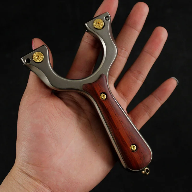 

Wood Patch Hunting Slingshot Catapult Stainless Steel with Aim Shooting with Flat Rubber Band 2019 New