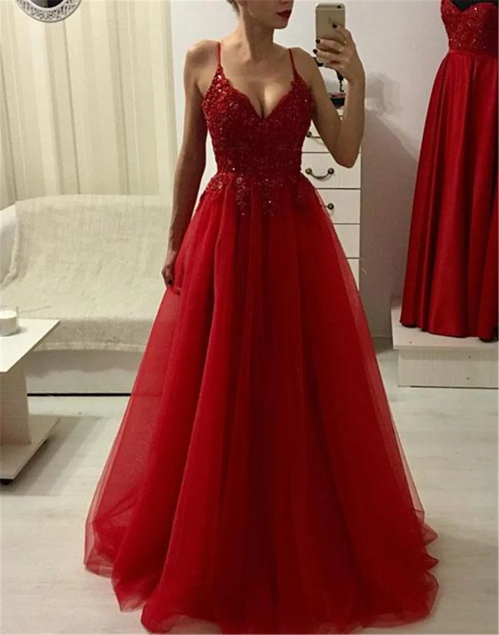 red spaghetti strap gown