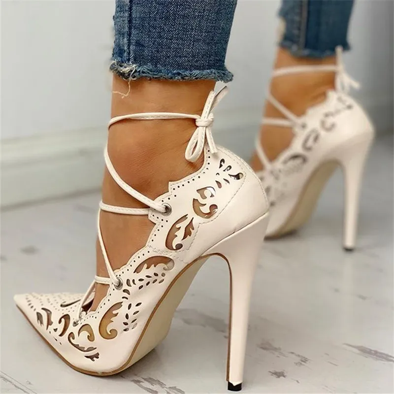 retro hollow out bandage stiletto pumps