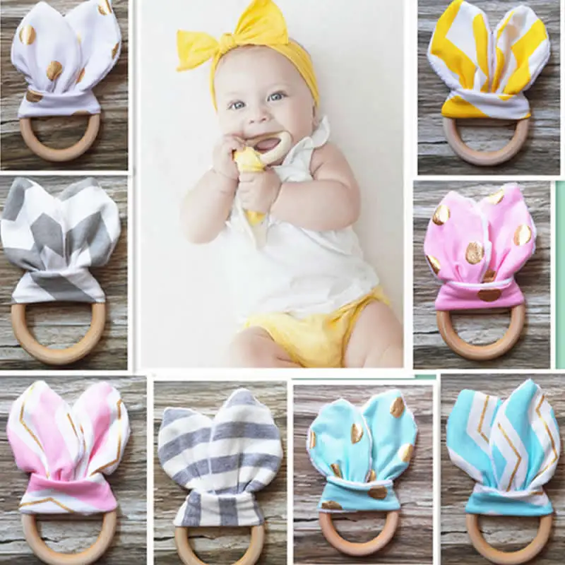 

Baby Teether Rubber wood ring Baby teeth grinding machine Dental practice toys Baby Bunny Ear Wooden Circle Teething Training