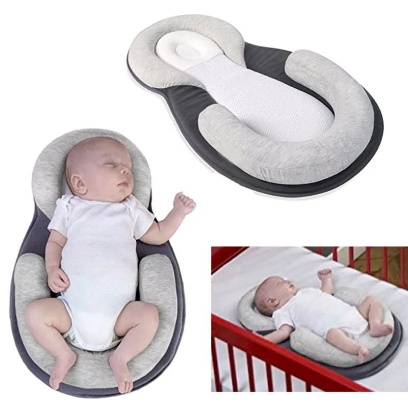 Comprar De bebé cuna de viaje almohada recién nacido Anti vuelco de cojín de seguridad de bebé dormir posicionamiento cojín portátil plegable cama