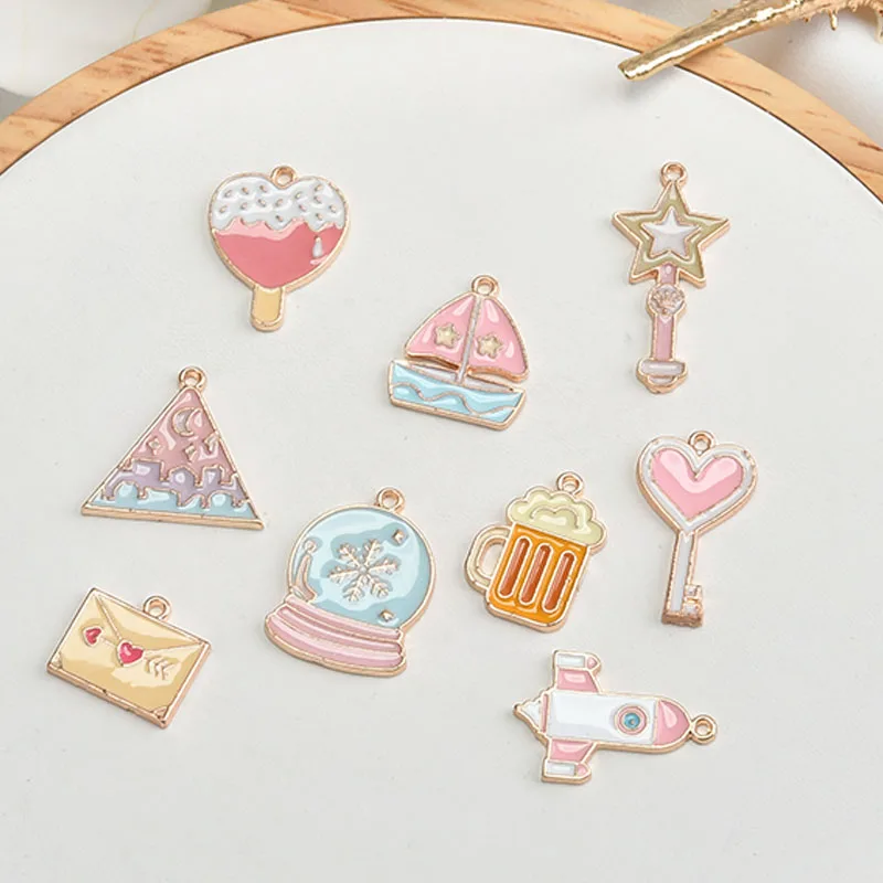 

50pcs/lot alloy drop oil cartoon snowflake balls/triangle/cup/rocket shape enamel floating locket charms diy jewelry pendants