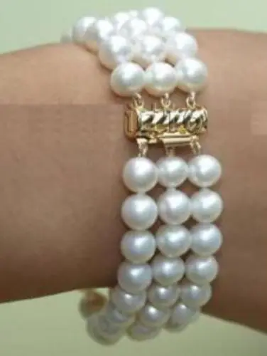 

FREE SHIPPING HOT sell new Style >>>> Graceful 3 rows 7-8mm white freshwater pearl bracelet 7.5" beads HU2105