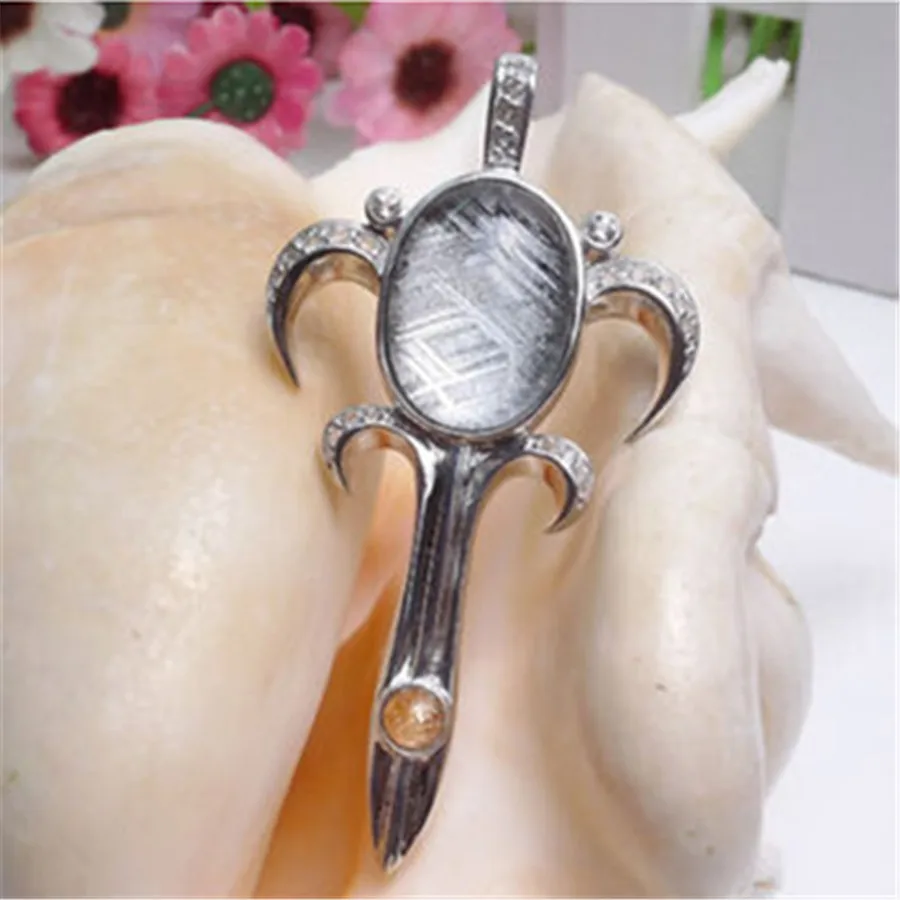 

Natural Jewelry Charm Genuine Gibeon Meteorite Dagger Shape Moldavite Powerful Women And Men Necklace Fashion Pendant 18x13x8mm