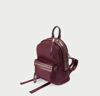 

Remote European and American light imported waterproof Oxford cloth stitching leather backpack