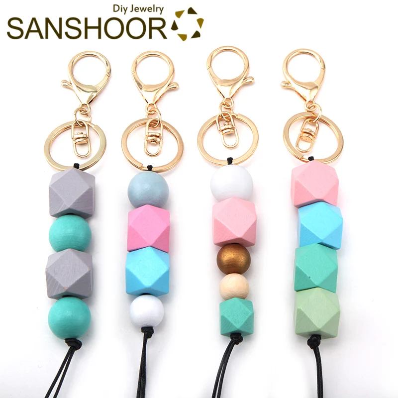 

SANSHOOR Handmade Wood Beads Keychain With Rainbow Geometric Round Shape Black Leather Rope 15-20cm Length For Women Gifts 1Pcs