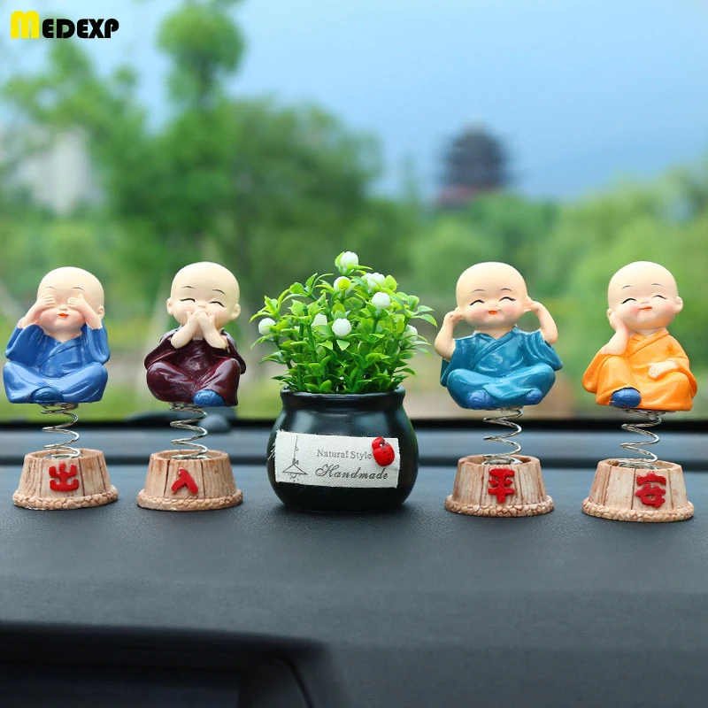 

Car decoration four not small monk personality creative resin spring cartoon shaking head doll auto accessory toys