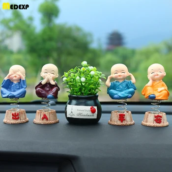 

Car decoration four not small monk personality creative resin spring cartoon shaking head doll auto accessory toys
