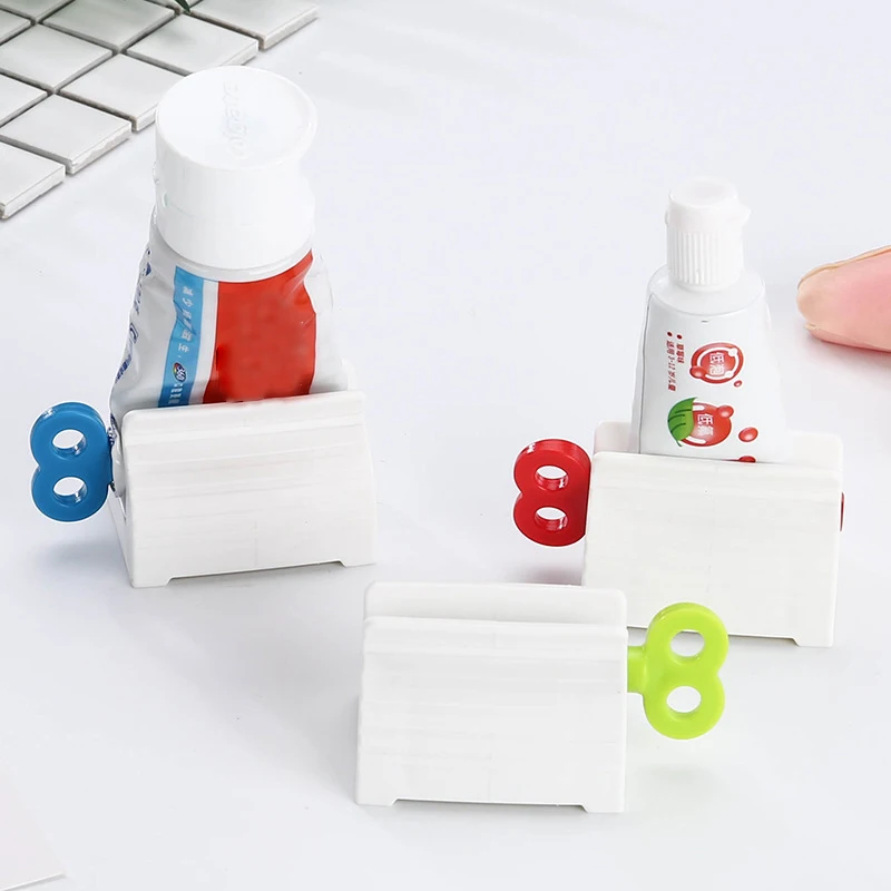 

Multifunctional Bathroom Plastic Cream Tube Squeezing Dispenser Rolling Tube Squeezer Tooth Paste Squeezer Toothpaste Dispenser