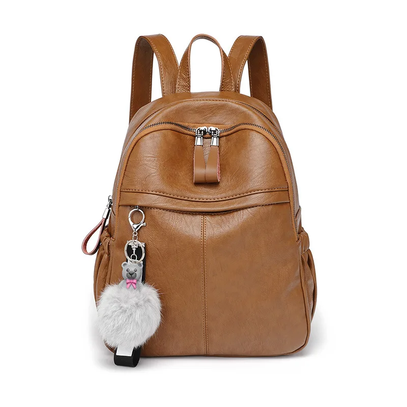 Leather shoulder bag female tide new trend explosion models student backpack leisure travel luggage to send bear ornaments |