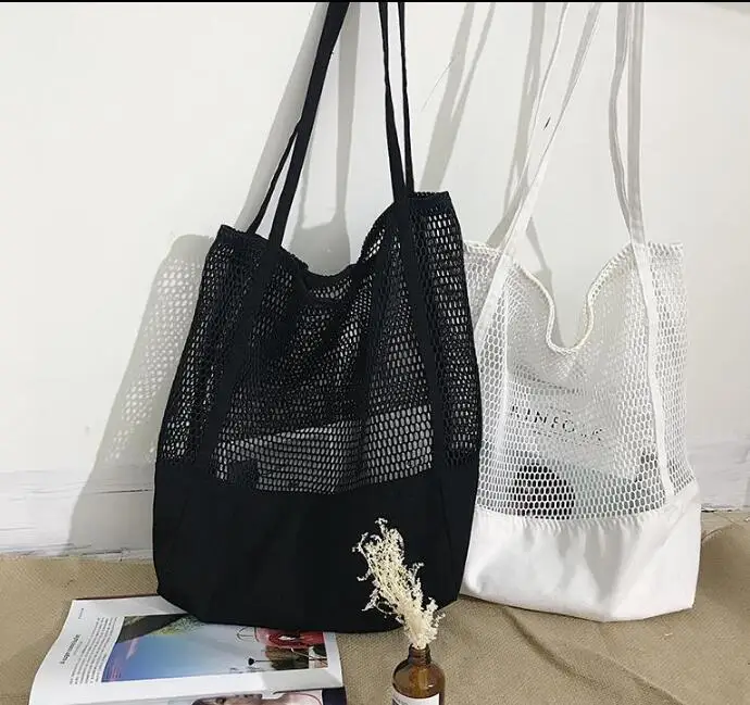 

2019 Summer new Korean version of the grid handbag shopping bag mesh hollow beach bag