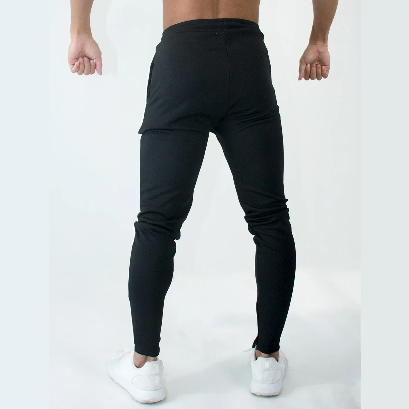 رجل ركض سراويل تقليدية اللياقة البدنية الرجال الرياضية قيعان نحيل Sweatpants السراويل الأزياء صالات رياضية عداء ببطء السراويل الترنك