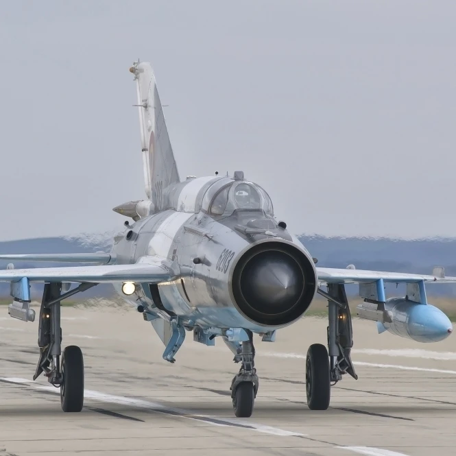 A Romanian Air Force MiG-21C taxiing at Camp Turzii Air Base  Romania Poster Print (34 x 22)