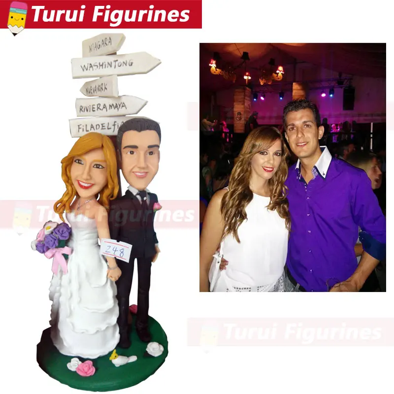 

holiday family couple figurine bobblehead dolls custom designed by Turui Figurines polymer clay dolls wedding cake topper custom