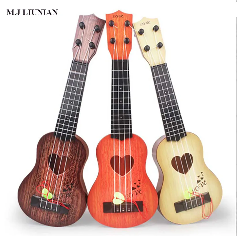 

Infant Playing Type Toy Musical Instrument Guitar Mini Baby Toys Plucked Children Instrument Kids Develop Puzzle toys 2019 New