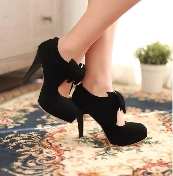 black pumps with a bow