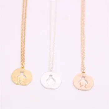 

Fashion penguin necklaces Beautiful circular hollow out penguin pendant necklaces Gap penguin pendant necklaces for women