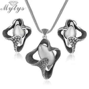 

Mytys Retro Grey Black Vintage Jewelry Sets Opal Pendant Flower Shape Earring and Flat Herringbone Necklace Sets for Women CN350