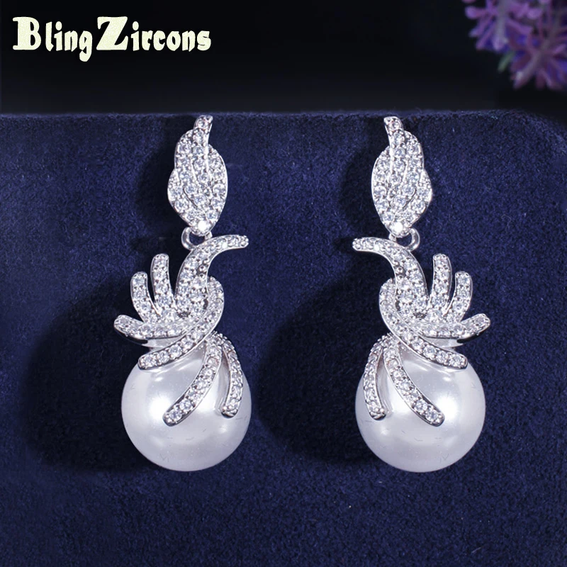 

BeaQueen Newest Silver Color Cubic Zirconia Stone Paved Fashion White Pearl Dangle Drop Earrings Jewelry for Women Gift E169
