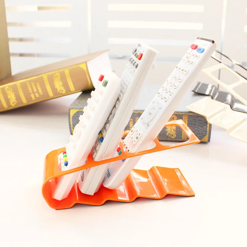 Novelty Remote Control TV Holder / Storage DVD VCR Step Remote