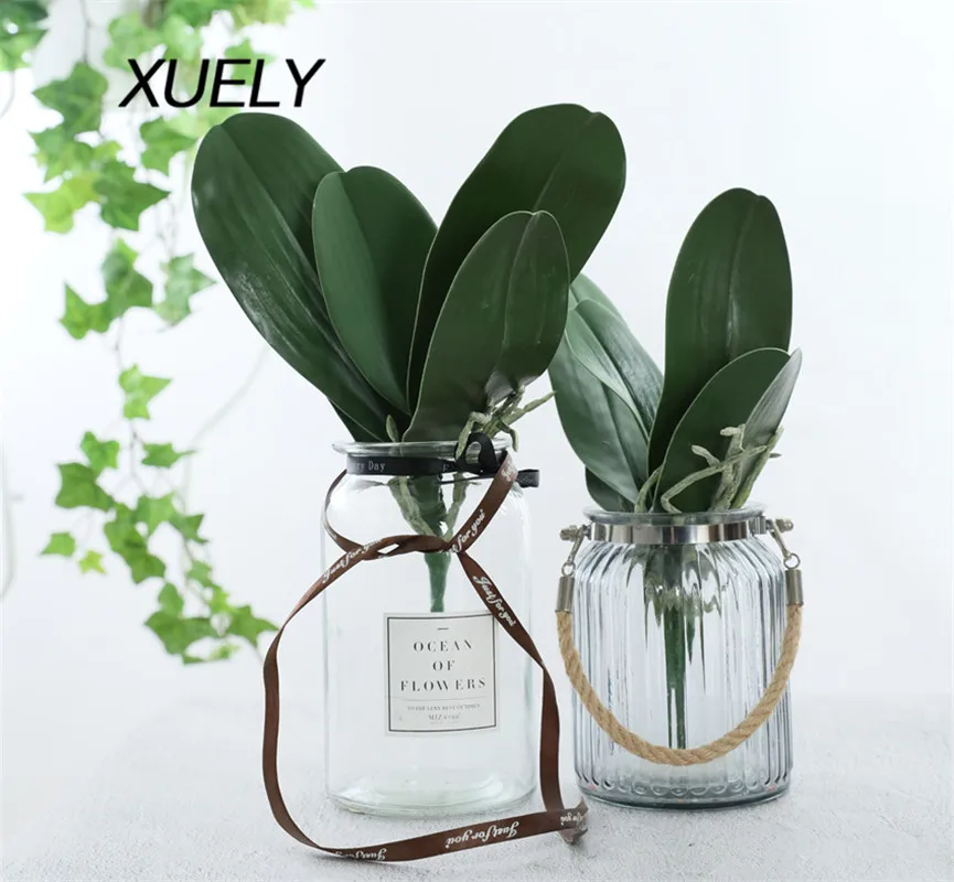 

Artificial plant PU phalaenopsis leaves fake orchid leaves with roots wedding home living room decoration Flower arrangement