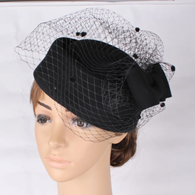 black fascinator hat with veil