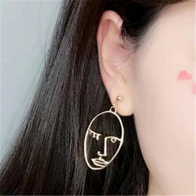 

Minimal fun face earrings abstract silhouette design hollow earrings