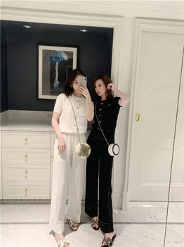 

Summer ice silk knit suit female 2020 new small fragrance openwork knit short sleeve wide leg pants fashion
