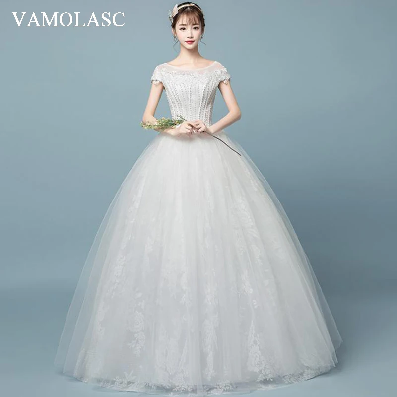 

VAMOLASC Illusion O Neck Beading Ball Gown Wedding Dresses Lace Appliques Short Cap Sleeve Backless Bridal Gowns