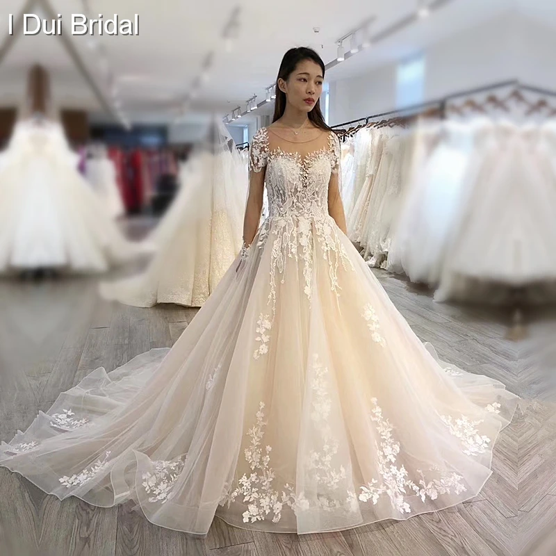illusion neckline wedding dress with long sleeves