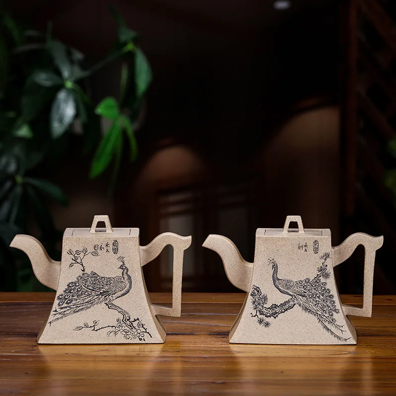 

Yixing Teapot Famous Full Manual Raw Ore High Temperature Square Bell Kettle Kungfu Online Teapot Tea Set Customized Wholesale