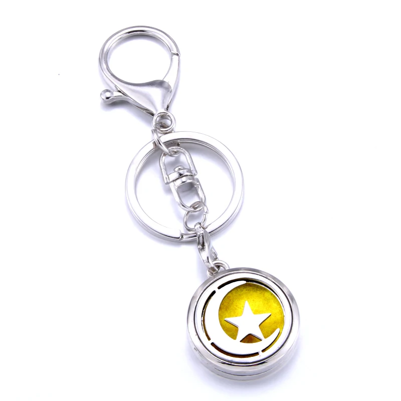 

Exquisite Moon stars pattern Aromatherapy Box Can Open Pendant Keychain Female Fashion Jewelry Wholesale Suitable for cars
