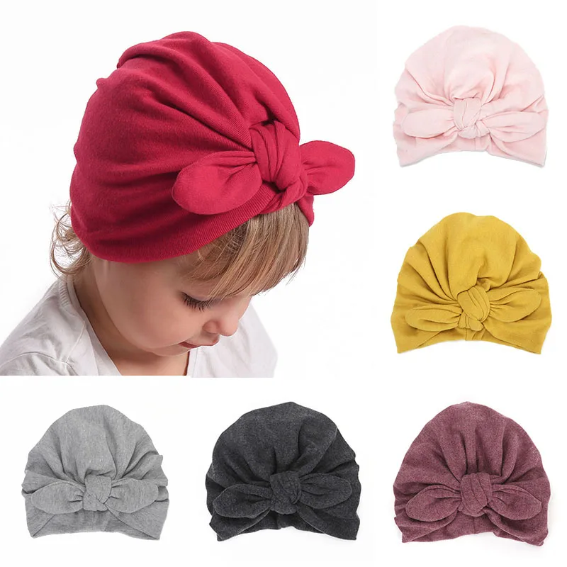 Зима-осень, новая Толстая теплая хлопковая вязаная детская шапка с большим бантом, чепчик для новорожденных от 0 до 24 месяцев, вязаная шапка для маленьких девочек, шапочка