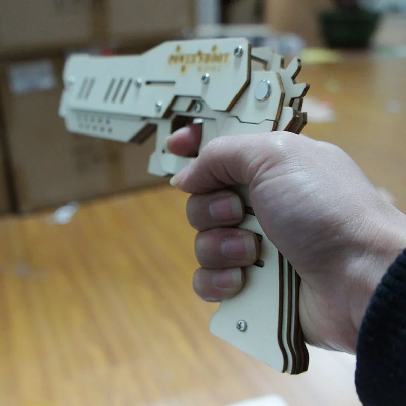 

Baby Kids Toy Guns Pistol Wooden Puzzle Soft Bullet DIY Toys Children Weapon Rubber Band Guns Pistola Brinquedo Armas Que Atiram