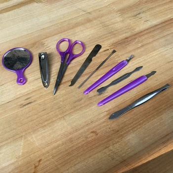 

Fast Delivery 20pcs/lot Wedding Favor 9 In 1 Stainless Kit Nail Careset Nail Clippers Cuticle Grooming Kit Utility Manicureset