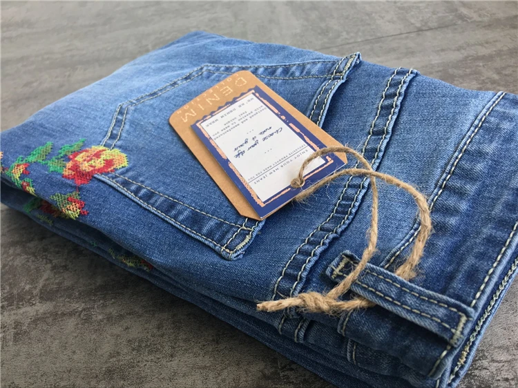 2017 European and American women's high waist elastic front and rear side of the cross embroidery roses washed cat to be cowboy pants pants pants (29)