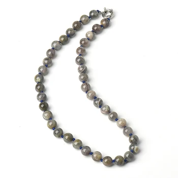 

Has Grayish gray and Transparent white with Gleaming Circular 10 mm Beads Imported Alexamdrite Necklace