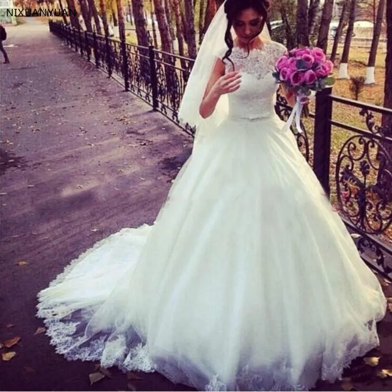 

2019 Modest A Line Wedding Dresses Sheer Jewel Neck Lace Top Puffy Tulle Waist with Sash Country Style Chic Bridal Wedding Gown